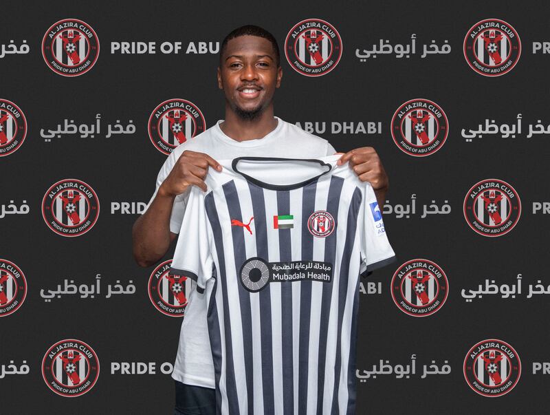 Abdoulay Diaby poses with the Al Jazira shirt after signing two-year deal with the Abu Dhabi club. Courtesy Al Jazira