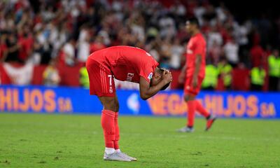 Real Madrid's Mariano reacts at the end of the match during La Liga soccer match between Sevilla and Real Madrid at the Sanchez Pizjuan stadium, in Seville, Spain on Wednesday, Sept. 26, 2018. Sevilla won 3-0. (AP Photo/Miguel Morenatti)