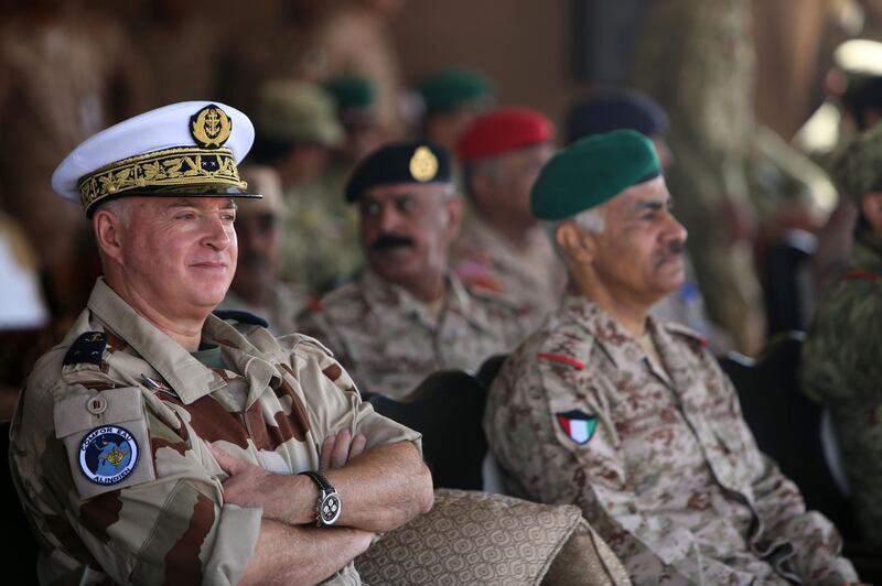 Kuwait's Chief of Staff Lt Gen Mohammad Al Khuder, right, and Commander of the French Forces deployed in the Indian Ocean (ALINDIEN) and the United Arab Emirates (COMFOR EAU) Rear Admiral Didier Maleterre watch the joint military exercise.