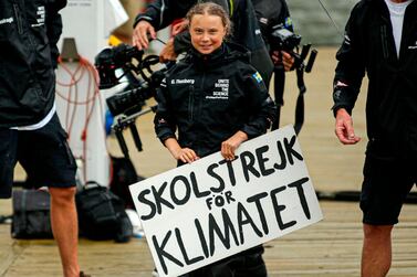 Swedish climate activist Greta Thunberg, 16, arrives in the US after a 15-day journey crossing the Atlantic in the Malizia II, a zero-carbon yacht, on August 28, 2019 in New York. "Land!! The lights of Long Island and New York City ahead," she tweeted early Wednesday. She later wrote on Twitter that her yacht had anchored off the entertainment district of Coney Island in Brooklyn to clear customs and immigration. / AFP / Kena Betancur