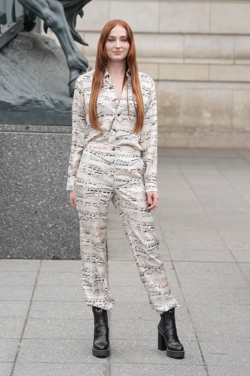 Sophie Turner arrives at the Louis Vuitton show. AP