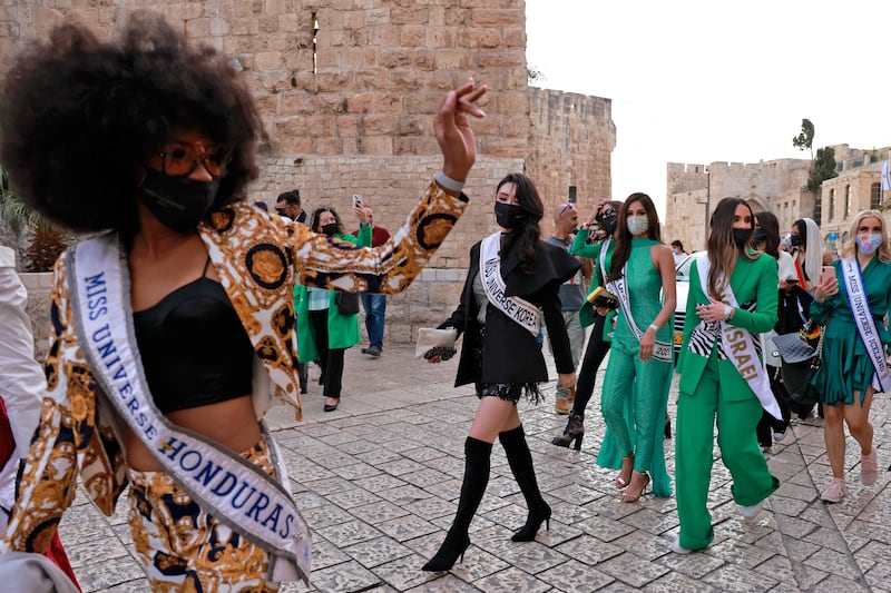 Miss Universe contestants arrive in Jerusalem's Old City. AFP