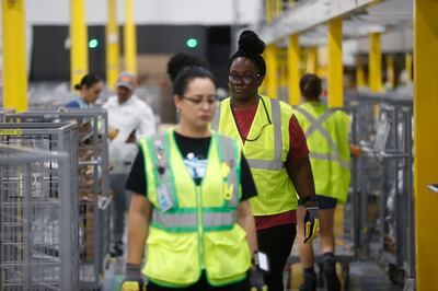 Amazon associates work to ship out same day orders during Cyber Monday.    Octavio Jones / Getty Images / AFP (Photo by Octavio Jones  /  GETTY IMAGES NORTH AMERICA  /  Getty Images via AFP)
