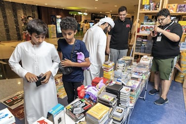 Shoppers at Insomnia Dubai, a gaming festival held at Meydan in October. Antonie Robertson / The National