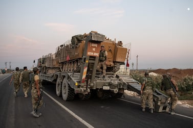 AKCAKALE, TURKEY - OCTOBER 09: Turkish soldiers prepare armored vehicles before crossing the border into Syria on October 09, 2019 in Akcakale, Turkey. The military action is part of a campaign to extend Turkish control of more of northern Syria, a large swath of which is currently held by Syrian Kurds, whom Turkey regards as a threat. U.S. President Donald Trump granted tacit American approval to this campaign, withdrawing his country's troops from several Syrian outposts near the Turkish border. (Photo by Burak Kara/Getty Images)