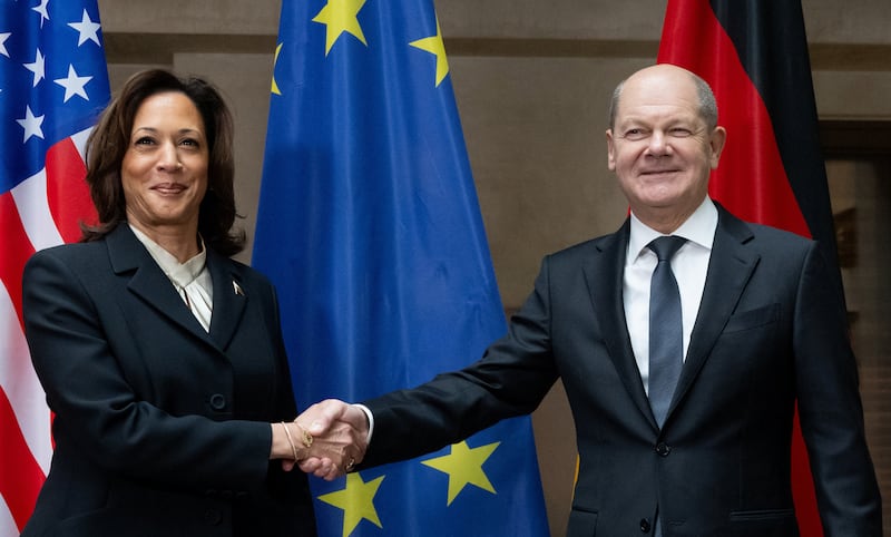 US Vice President Kamala Harris shakes hands with German Chancellor Olaf Scholz during the Munich Security Conference. Reuters