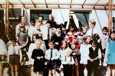 Sheikh Zayed pictured with pupils at the school's original campus near the Corniche in 1968. Courtesy BSAK