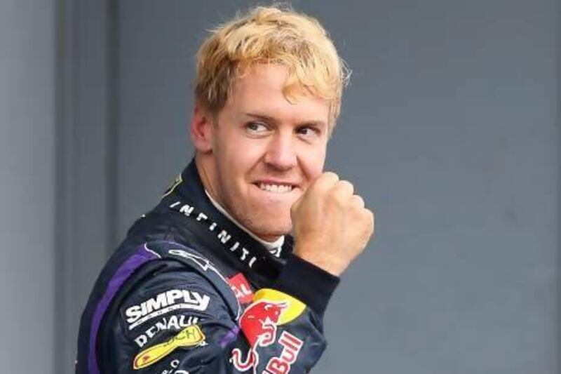 Sebastian Vettel of Red Bull celebrates after winning the Italian Grand Prix.