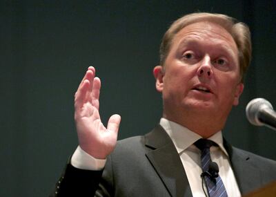 FILE PHOTO: Henrik Fisker, co-founder, executive chairman and chief designer at Fisker Automotive, speaks during the Chicago Auto Show, February 7, 2013. REUTERS/John Gress/File Photo