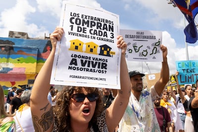 People take part in a protest to demand an urgent rethink of the Canary Islands' tourism model, in Las Palmas de Gran Canaria, Canary Islands. EPA