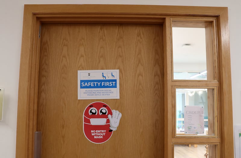 No entry without mask stickers are pasted outside classrooms at Brighton College Dubai.