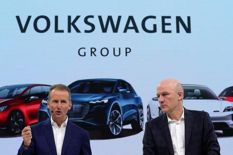 Herbert Diess, chief executive officer of Volkswagen AG (VW), left, speaks beside Frank Witter, chief financial officer of Volkswagen AG (VW), during the automaker’s annual news conference in Wolfsburg, Germany, on Tuesday, March 12, 2019.  Volkswagen’s profitability for the main VW, Audi and Porsche brands fell last year amid strains for the transition to electric cars and the German carmaker’s push for a deeper overhaul. Photographer: Krisztian Bocsi/Bloomberg