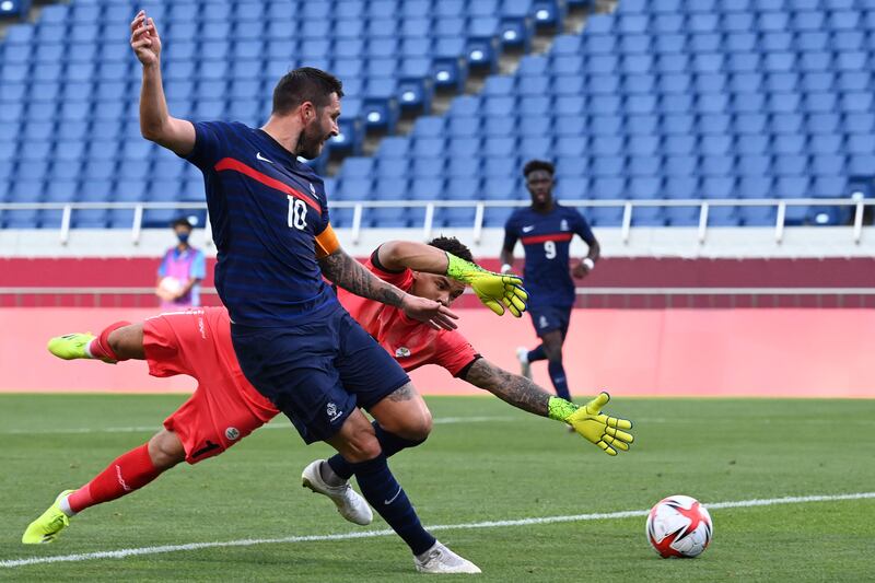France forward Andre-Pierre Gignac tries to score past South Africa's goalkeeper Ronwen Williams.