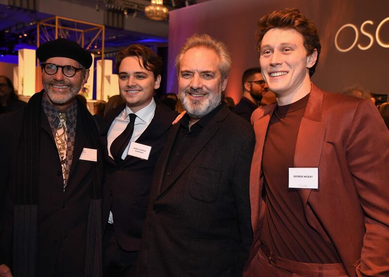 Production designer Dennis Gassner, actor Dean-Charles Chapman, director Sam Mendes and actor George MacKay pose during the luncheon. AFP