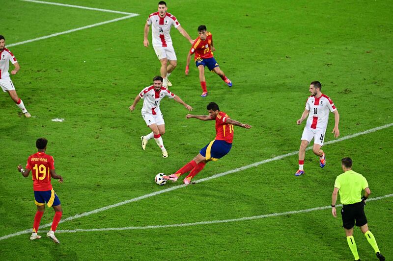 Spain's Rodri scores his team's first goal. AFP