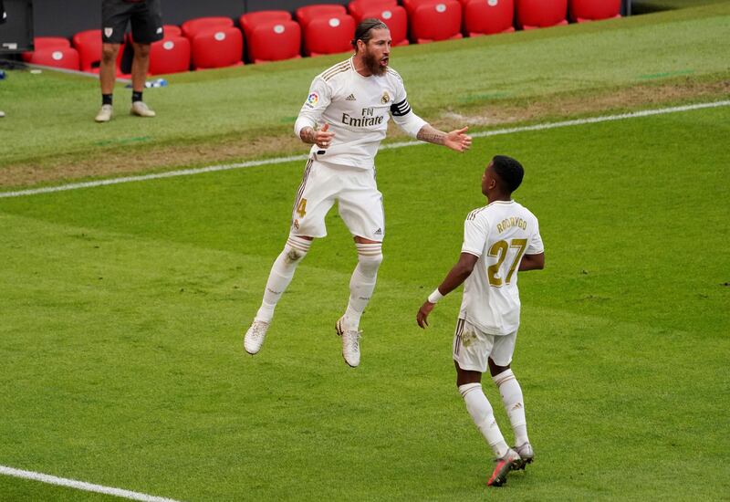 Real Madrid's Sergio Ramos celebrates scoring their first goal from the penalty spot. Reuters