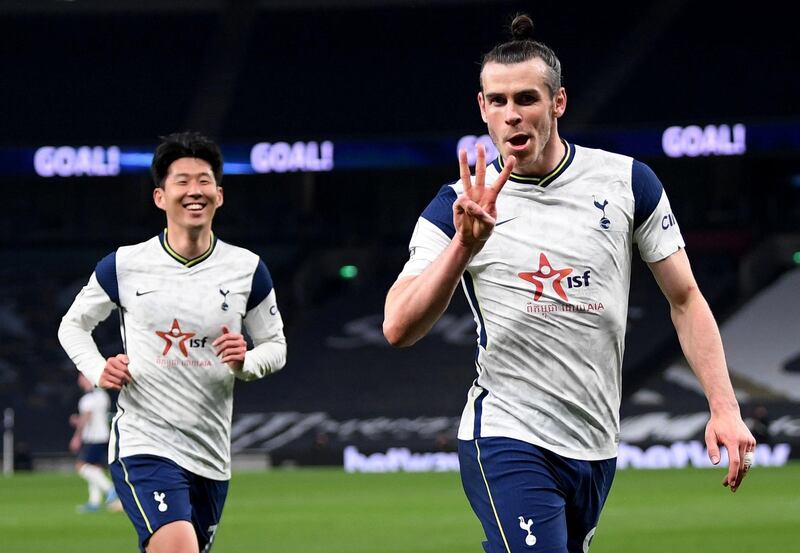 Soccer Football - Premier League - Tottenham Hotspur v Sheffield United - Tottenham Hotspur Stadium, London, Britain - May 2, 2021 Tottenham Hotspur's Gareth Bale celebrates scoring their third goal and completes his hat-trick Pool via REUTERS/Shaun Botterill EDITORIAL USE ONLY. No use with unauthorized audio, video, data, fixture lists, club/league logos or 'live' services. Online in-match use limited to 75 images, no video emulation. No use in betting, games or single club /league/player publications.  Please contact your account representative for further details.     TPX IMAGES OF THE DAY