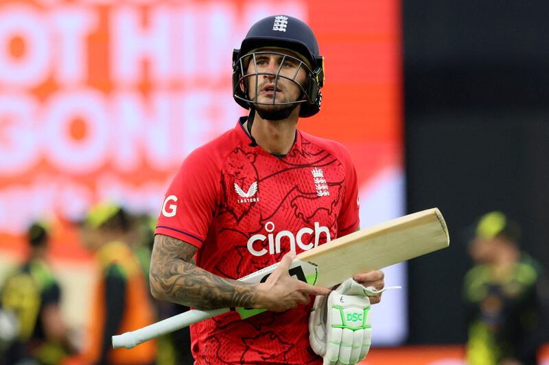 Alex Hales walks of the field after his dismissal. AFP