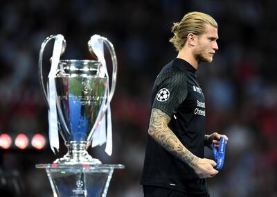 KIEV, UKRAINE - MAY 26:  Loris Karius of Liverpool walks past the trophy looking dejected after the UEFA Champions League Final between Real Madrid and Liverpool at NSC Olimpiyskiy Stadium on May 26, 2018 in Kiev, Ukraine.  (Photo by Shaun Botterill/Getty Images)