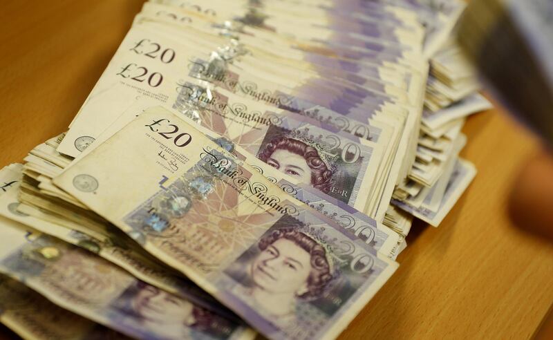 FILE PHOTO: British Pound Sterling banknotes are seen at the Money Service Austria company's headquarters in Vienna, Austria, November 16, 2017. REUTERS/Leonhard Foeger/File Photo