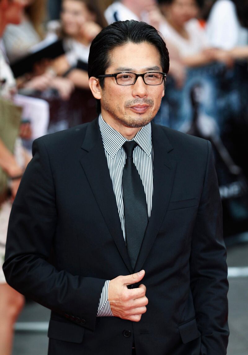 Actor Hiroyuki Sanada poses at the UK Premiere of "The Wolverine" at Leicester Square in London July 16, 2013. REUTERS/Luke MacGregor (BRITAIN - Tags: ENTERTAINMENT) *** Local Caption ***  LON124_BRITAIN-_0716_11.JPG