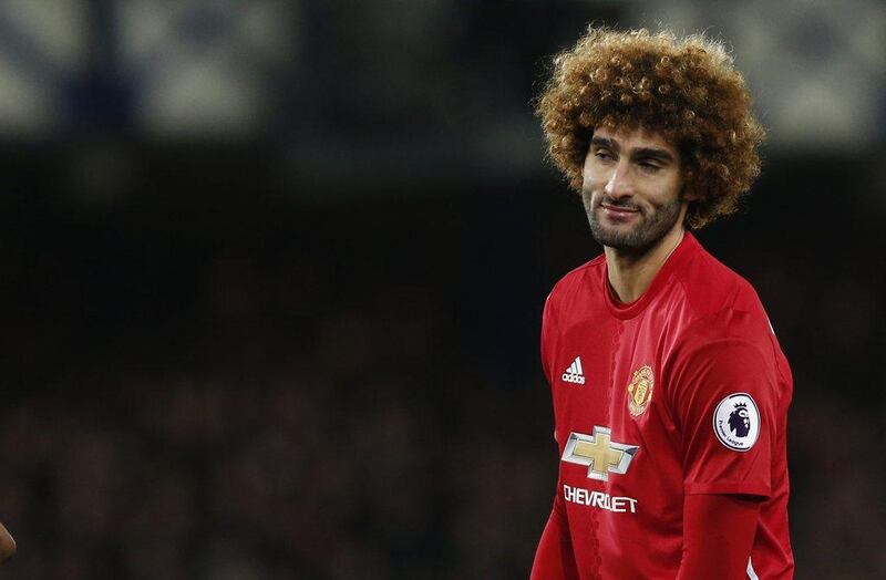 Manchester United's Marouane Fellaini looks dejected after conceding a penalty on Sunday. Andrew Yates / Reuters / December 4, 2016