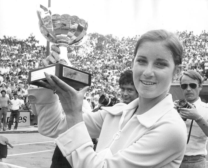 18th June 1974:  American tennis player Chris Evert (Chris Lloyd) holding the trophy after winning the women's title at the French Open in Paris.  (Photo by Keystone/Getty Images)