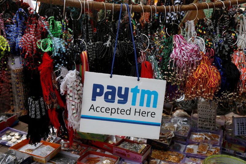 FILE PHOTO: An advertisement of Paytm, a digital wallet company, is pictured at a road side stall in Kolkata, India, January 25, 2017. REUTERS/Rupak De Chowdhuri/File Photo