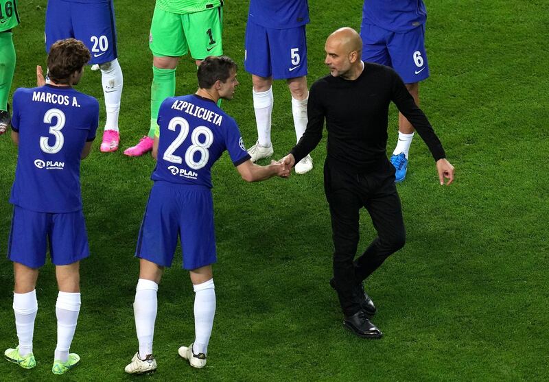 Pep Guardiola and Chelsea's Cesar Azpilicueta shake hands after the final whistle. PA