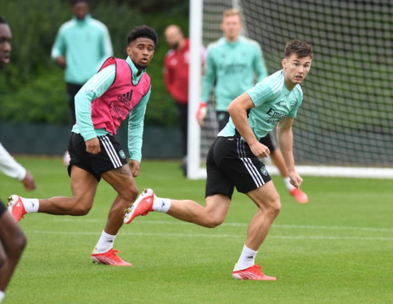 Reiss Nelson, left, and Kieran Tierney at London Colney.