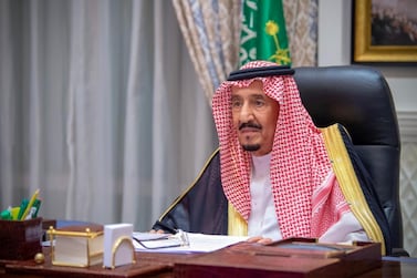 Saudi King Salman delivers a speech during the first session of Shura Council, from his palace in Neom, Saudi Arabia, on November 11, 2020. Saudi Royal Court / Reuters