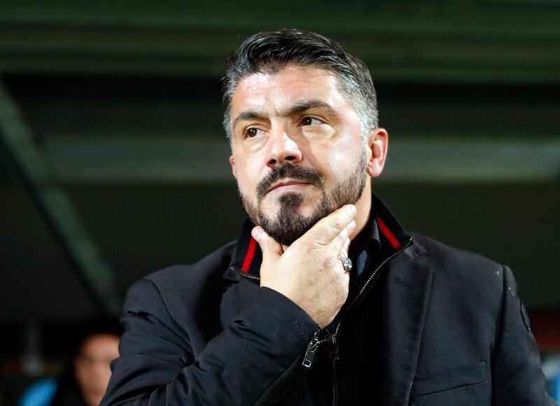 FILE - In this Dec. 7, 2017 file photo, AC Milan head coach Gennaro Gattuso looks from the bench ahead of the group D Europa League soccer match between Rijeka and AC Milan, at the Rujevica stadium in Rijeka, Croatia. The bearded Gattuso is getting compliments as a coach as his rejuvenated Milan side has climbed up to seventh in the table, sparking talk it could still sneak into the Champions League. (AP Photo/Darko Bandic, files)