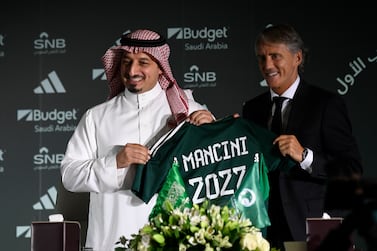 Roberto Mancini and Yasser Al Misehal, the Saudi Arabian Football Federation president, attend a press conference in Riyadh, Saudi Arabia, on Monday, Aug.  28, 2023.  Mancini was appointed coach of the Saudi Arabia national team on Sunday, just two weeks after the European Championship-winning manager surprisingly left his job in charge of Italy.  (AP Photo)