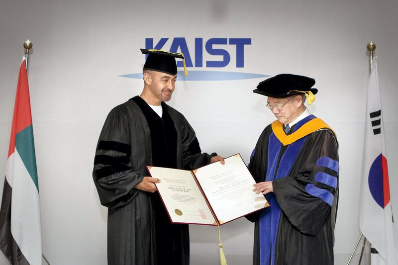 SEOUL, REPUBLIC OF KOREA (SOUTH KOREA) - May 27, 2010: (left) HH General Sheikh Mohamed bin Zayed Al Nahyan, Crown Prince of Abu Dhabi, Deputy Supreme Commander of the UAE Armed Forces receives an Honorary Degree of Doctor of Science and Technology in Humane Letters by (right) Dr. Nam-Pyo Suh President, KAIST. ( Ryan Carter / Crown Prince Court - Abu Dhabi )