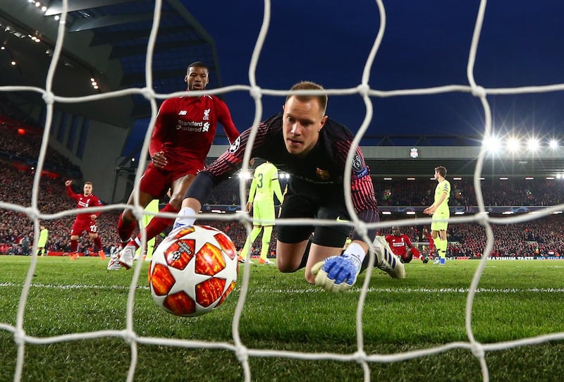 LIVERPOOL, ENGLAND - MAY 07:  Marc-Andre Ter Stegan of Barcelona fails to stop Georginio Wijnaldum of Liverpool from scoring his team's second goal during the UEFA Champions League Semi Final second leg match between Liverpool and Barcelona at Anfield on May 07, 2019 in Liverpool, England. (Photo by Clive Brunskill/Getty Images)
