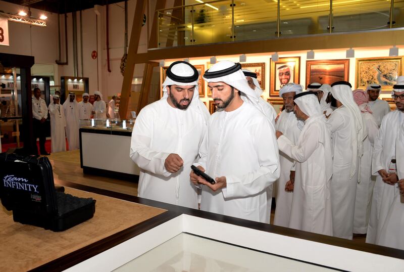 Sheikh Hamdan bin Mohammed, Crown Prince of Dubai, visits hunting weapons stalls at Adihex on Friday. Wam