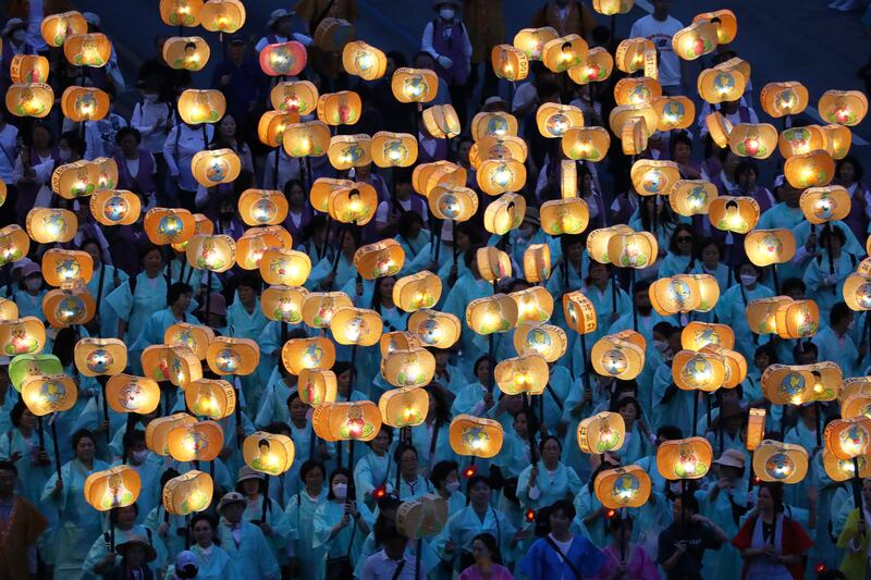 Buddhists carry lanterns in a parade during the Lotus Lantern Festival to celebrate the upcoming birthday of Buddha in Seoul, South Korea. Getty