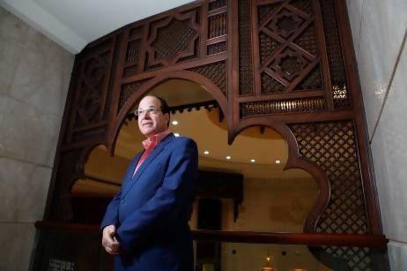 The Egyptian author Nasser Iraq believes Dubai has much to offer writers because of the world's growing interest in the region. Sarah Dea / The National