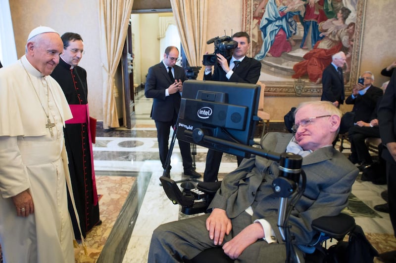 Pope Francis, left, meets with English theoretical physicist and cosmologist Stephen Hawking at the Vatican on November 28, 2016. Filippo Monteforte / AFP