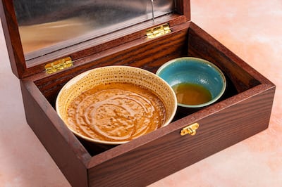 The restaurant's signature dish is daal infused with edible gold. Photo: KashKan