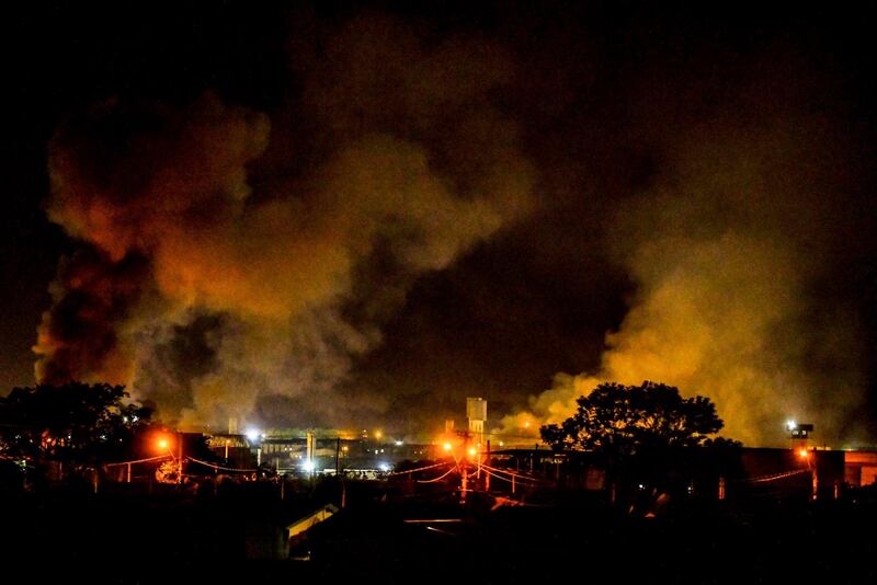 TOPSHOT - Overview of the Doctor Edgar Magalhaes Noronha (Pemano) Penitentiary taken during a riot on early March 17, 2020, in Tremembe, 155 km from Sao Paulo, Brazil. Hundreds of prisoners rebelled and fled from various jails in the interior of Sao Paulo on March 16 after authorities suspended a temporary release of inmates to prevent the spread of the coronavirus. More than 440 were already recaptured. / AFP / Lucas LACAZ
