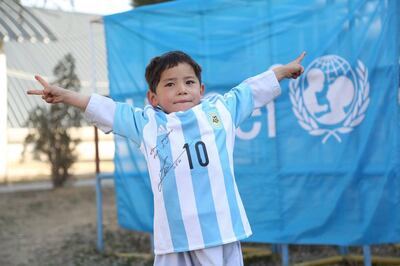 Murtaza Ahmadi, the Afghan boy who wanted a Messi shirt so bad his brother made one for him out of a plastic bag


Courtesy Unicef *** Local Caption ***  on26fe-messi-boy.jpg