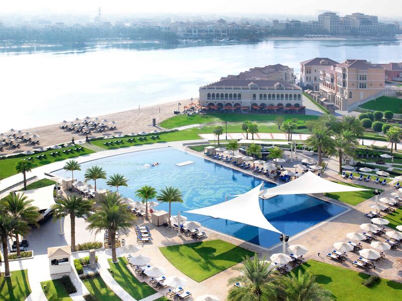A handout photo of The Ritz-Carlton Abu Dhabi, Grand Canal Pool-Beach (Courtesy: The Ritz-Carlton Abu Dhabi, Grand Canal) *** Local Caption ***  wk25no-tr-briefs-ritz.jpg