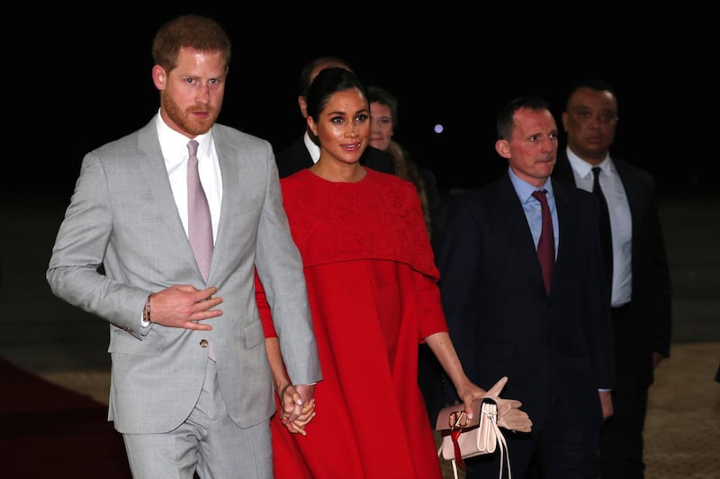 Prince Harry, Duke of Sussex and wife Meghan, Duchess of Sussex, are welcomed by British Ambassador to Morocco Thomas Reilly as they arrive at Casablanca Airport.  EPA
