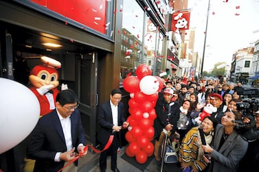 Chief executive Ernesto Tanmantiong was greeted by long queues in London at the opening of Jollibee’s first restaurant in the UK in October. Reuters