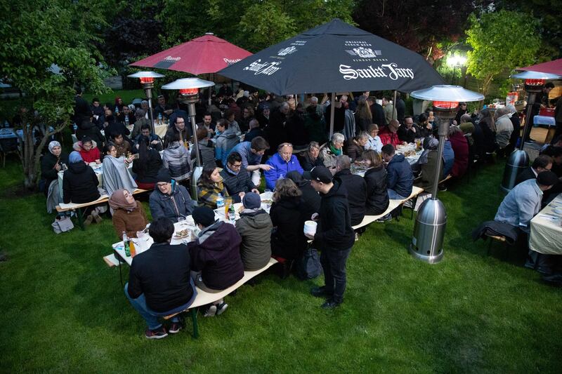 People from the House of One gather for iftar in Berlin, Germany.  EPA