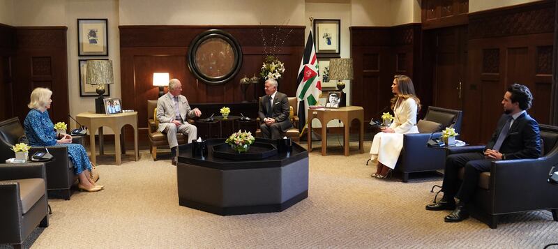 Inside the Jordanian royal palace, the visiting British royals sat down with King Abdullah II, Queen Rania and their son, Crown Prince Hussein. EPA