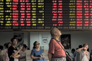 China's inclusion in global market indexes may not be good news for other emerging markets, the IMF says. AFP. 