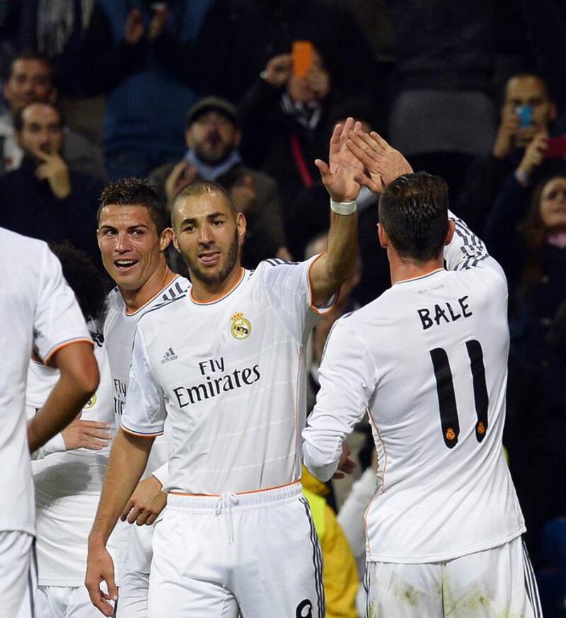 Cristiano Ronaldo, left, Karim Benzema, centre, and Gareth Bale of Real Madrid are finally delivering on the attacking promise suggested by their individual talent. Gerard Julien / AFP