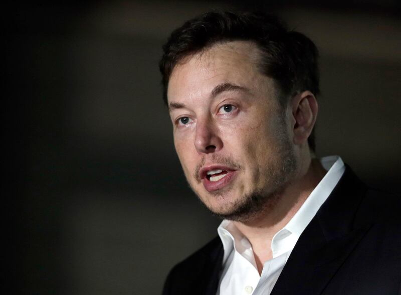FILE - In a Thursday, June 14, 2018 file photo, Tesla CEO and founder of the Boring Company Elon Musk speaks at a news conference, in Chicago. Whether itâ€™s investors betting against his stock, reporters or analysts who ask tough questions or a union trying to organize his workers, Elon Musk has fought back, often around the clock on Twitter. But when Musk called a British diver involved in the Thailand cave rescue a pedophile to 22.3 million Twitter followers on July 15, he may have gone one tweet too far.   (AP Photo/Kiichiro Sato, File)